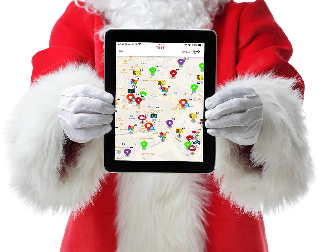 Santa holding an iPad