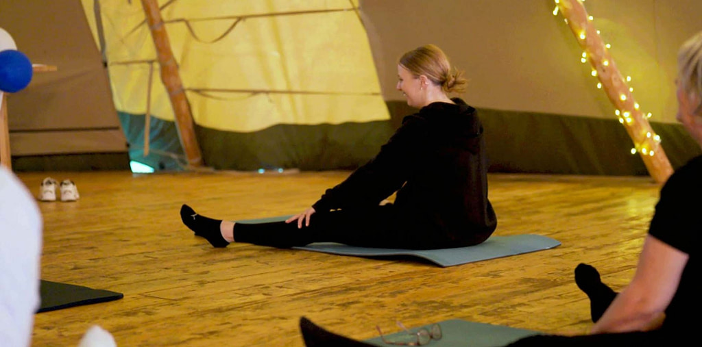 Team doing yoga